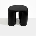 Dinosaur Designs 4-Leg Rock Tower Table in Black — handcrafted black resin side table with square top and four chunky rounded legs