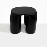 Dinosaur Designs 4-Leg Rock Tower Table in Black — handcrafted black resin side table with square top and four chunky rounded legs