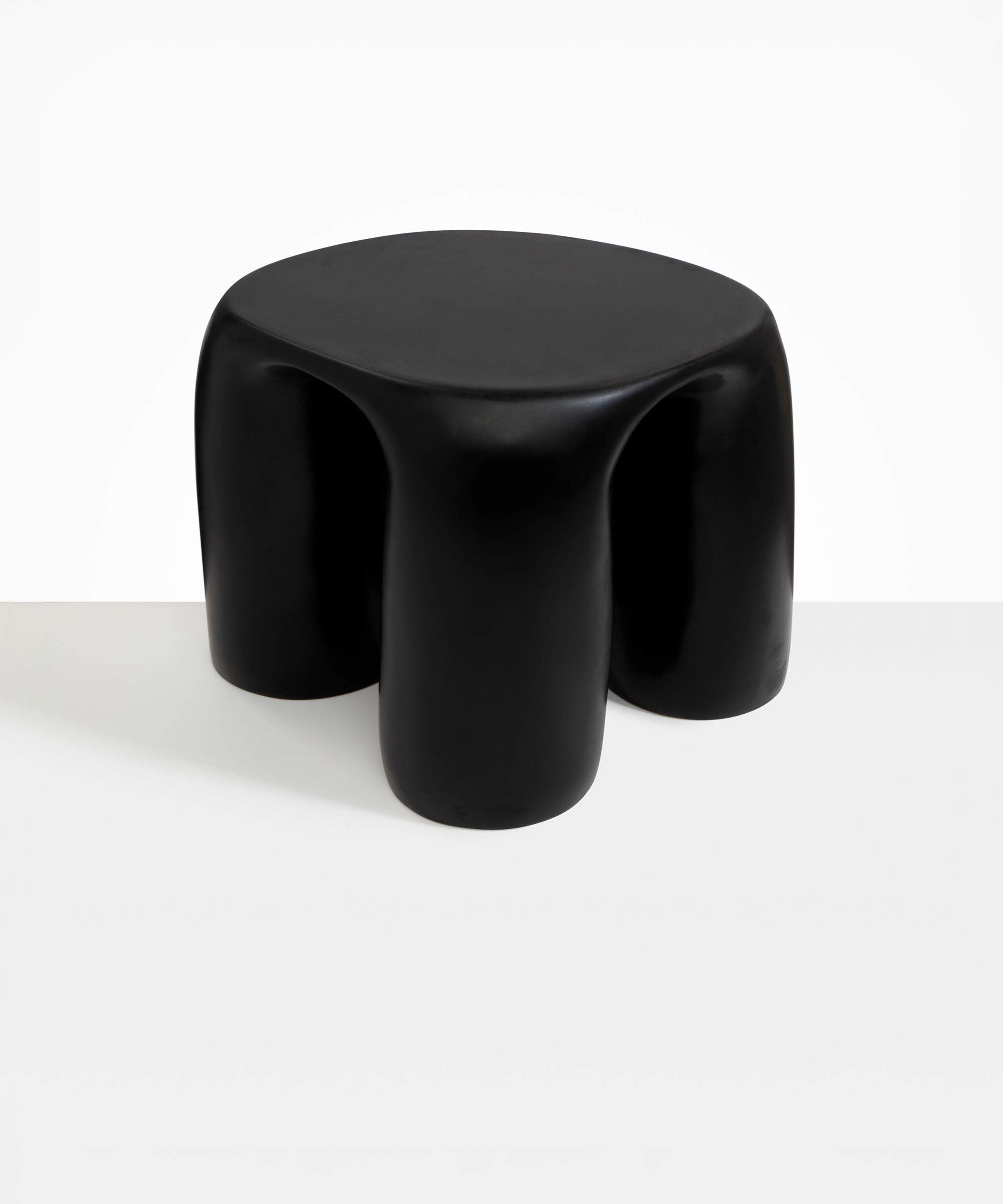 Dinosaur Designs 4-Leg Rock Tower Table in Black — handcrafted black resin side table with square top and four chunky rounded legs