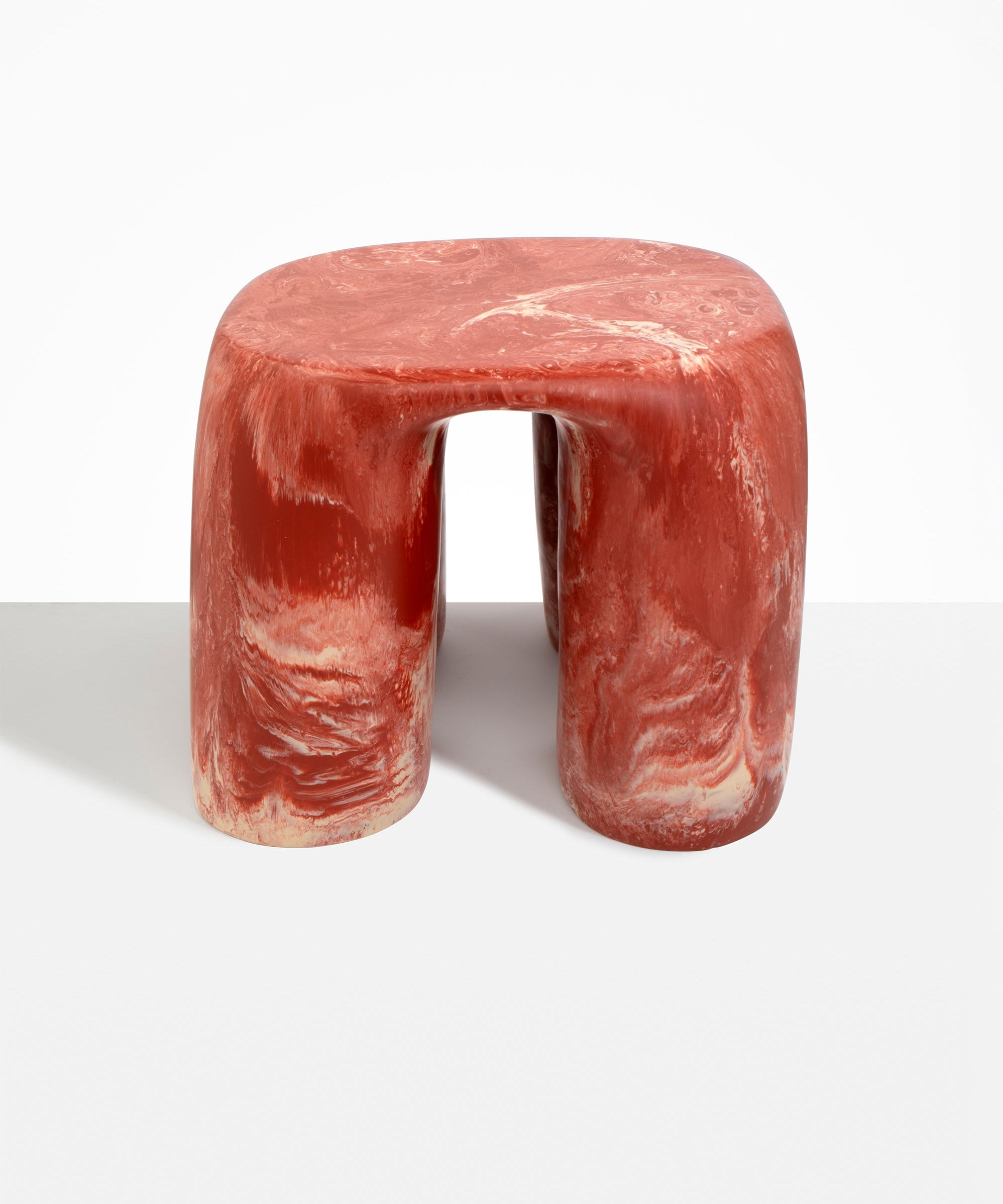 Dinosaur Designs 4-Leg Rock Tower Table in Rust — handcrafted marbled terracotta red and cream resin side table with square top and four chunky rounded legs.