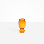 Dinosaur Designs Small Glass Rockpool Vase in Amber — handblown amber glass vase with rounded bulbous body and small spherical pedestal base
