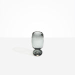 Dinosaur Designs Small Glass Rockpool Vase in Clear Black — handblown transparent black glass vase with rounded bulbous body and small spherical pedestal base