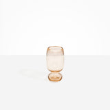 Dinosaur Designs Small Glass Rockpool Vase in Clear Brown — handblown transparent brown glass vase with rounded bulbous body and small spherical pedestal base