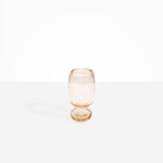 Dinosaur Designs Small Glass Rockpool Vase in Clear Brown — handblown transparent brown glass vase with rounded bulbous body and small spherical pedestal base