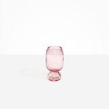 Dinosaur Designs Small Glass Rockpool Vase in Pink — handblown transparent pink glass vase with rounded bulbous body and small spherical pedestal base