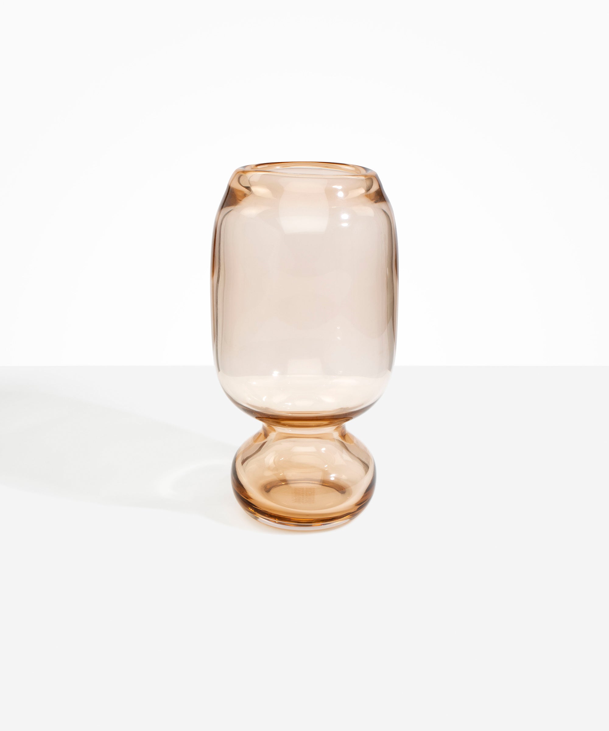 Dinosaur Designs Tall Glass Rockpool Vase in Clear Brown — handblown transparent brown glass vase with rounded bulbous body and spherical pedestal base