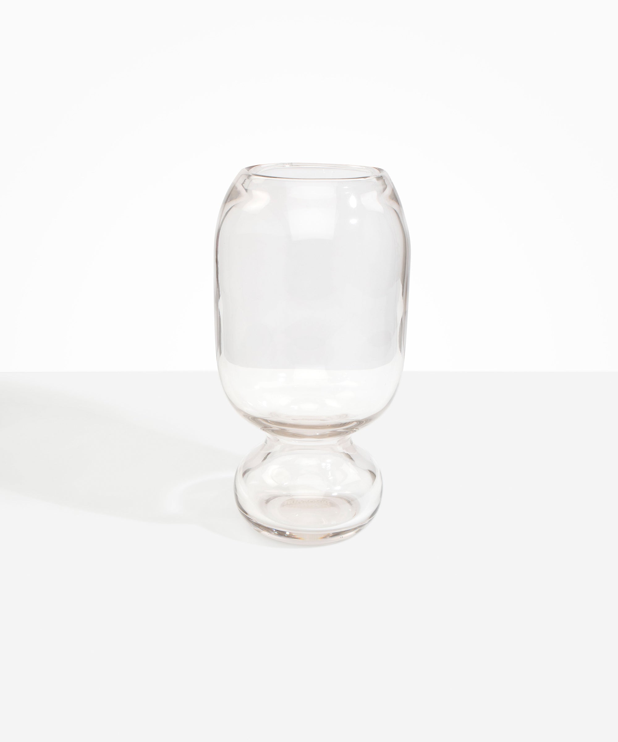 Dinosaur Designs Tall Glass Rockpool Vase in Clear — handblown transparent glass vase with rounded bulbous body and spherical pedestal base