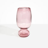 Dinosaur Designs Tall Glass Rockpool Vase in Pink — handblown transparent pink glass vase with rounded bulbous body and spherical pedestal base