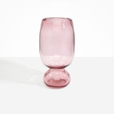 Dinosaur Designs Tall Glass Rockpool Vase in Pink — handblown transparent pink glass vase with rounded bulbous body and spherical pedestal base