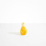 Dinosaur Designs medium sized Liquid vase in daisy yellow colour resin..