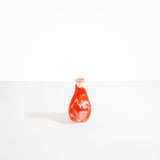 Dinosaur Designs Medium Liquid Vase in Strawberry Colour resin..
