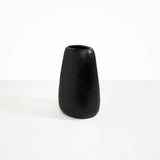 Dinosaur Designs Large Pebble Vase in Black — handcrafted black resin vase with smooth rounded pebble form and narrow opening