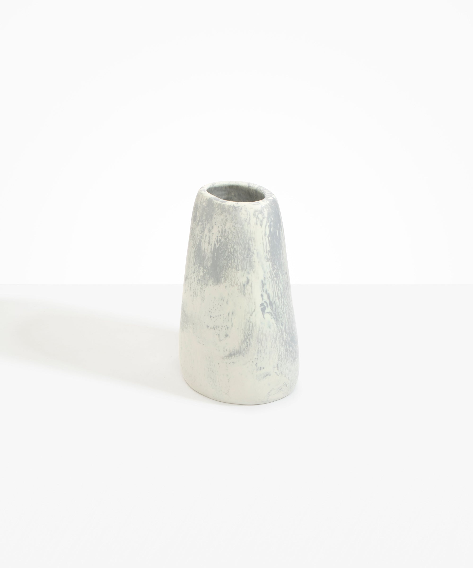 Dinosaur Designs Large Pebble Vase in Cloud — handcrafted marbled cream and grey resin vase with smooth rounded pebble form and narrow opening