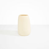 Dinosaur Designs Large Pebble Vase in Cream — handcrafted cream resin vase with smooth rounded pebble form and narrow opening