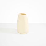 Dinosaur Designs Large Pebble Vase in Cream — handcrafted cream resin vase with smooth rounded pebble form and narrow opening