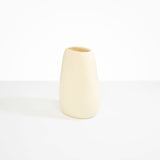 Dinosaur Designs Large Pebble Vase in Cream — handcrafted cream resin vase with smooth rounded pebble form and narrow opening