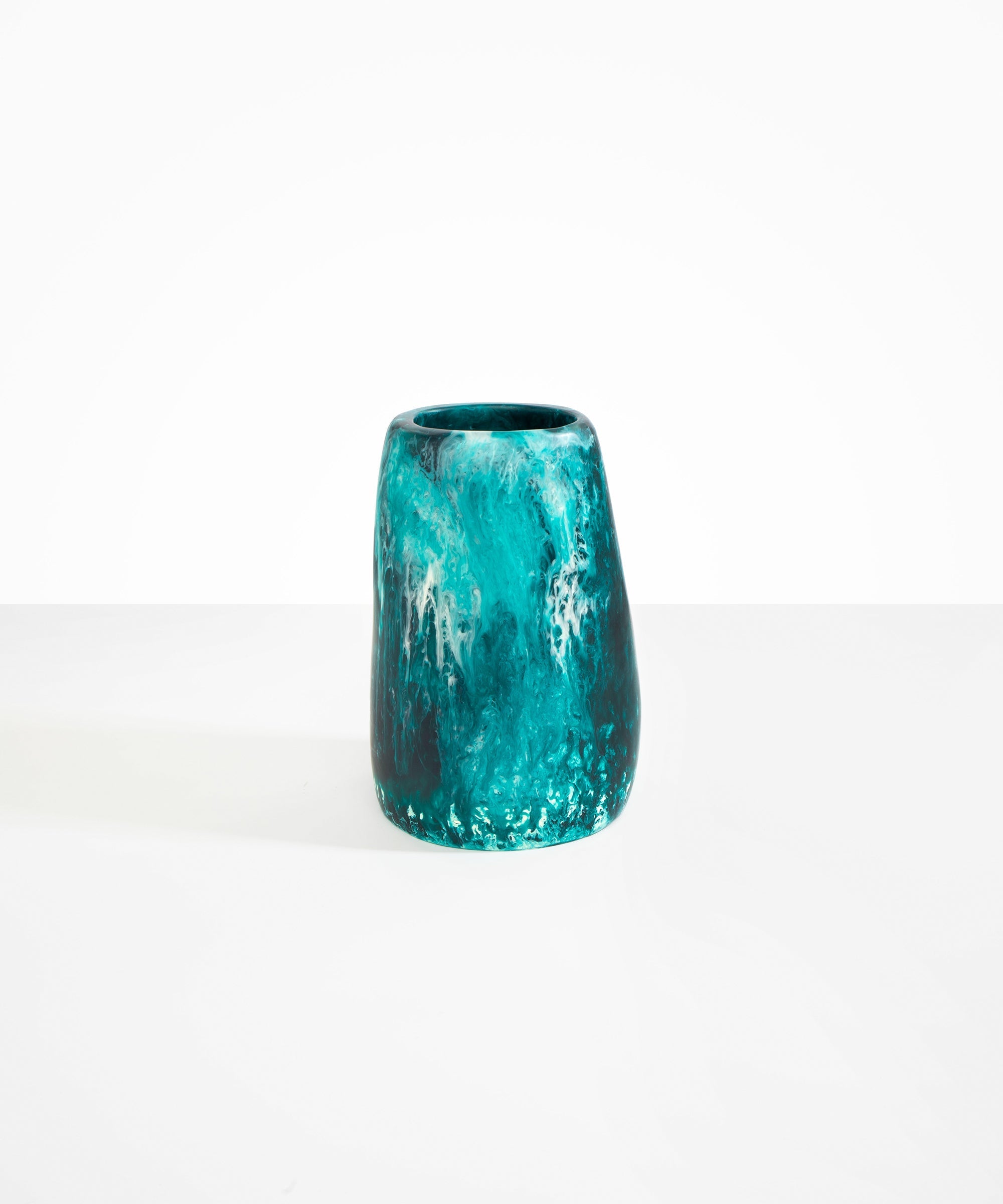 Dinosaur Designs Large Pebble Vase in Lagoon — handcrafted marbled blue, cream and clear resin vase with smooth rounded pebble form and narrow opening