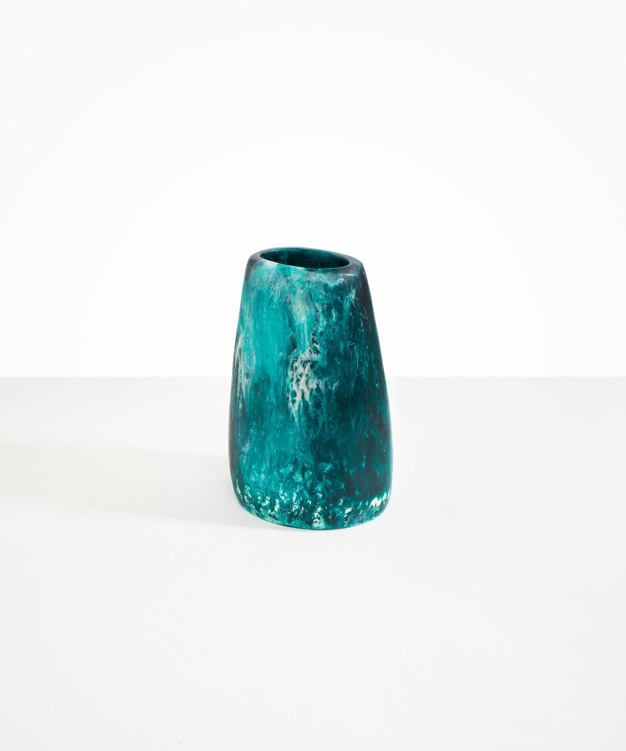 Dinosaur Designs Large Pebble Vase in Lagoon — handcrafted marbled blue, cream and clear resin vase with smooth rounded pebble form and narrow opening