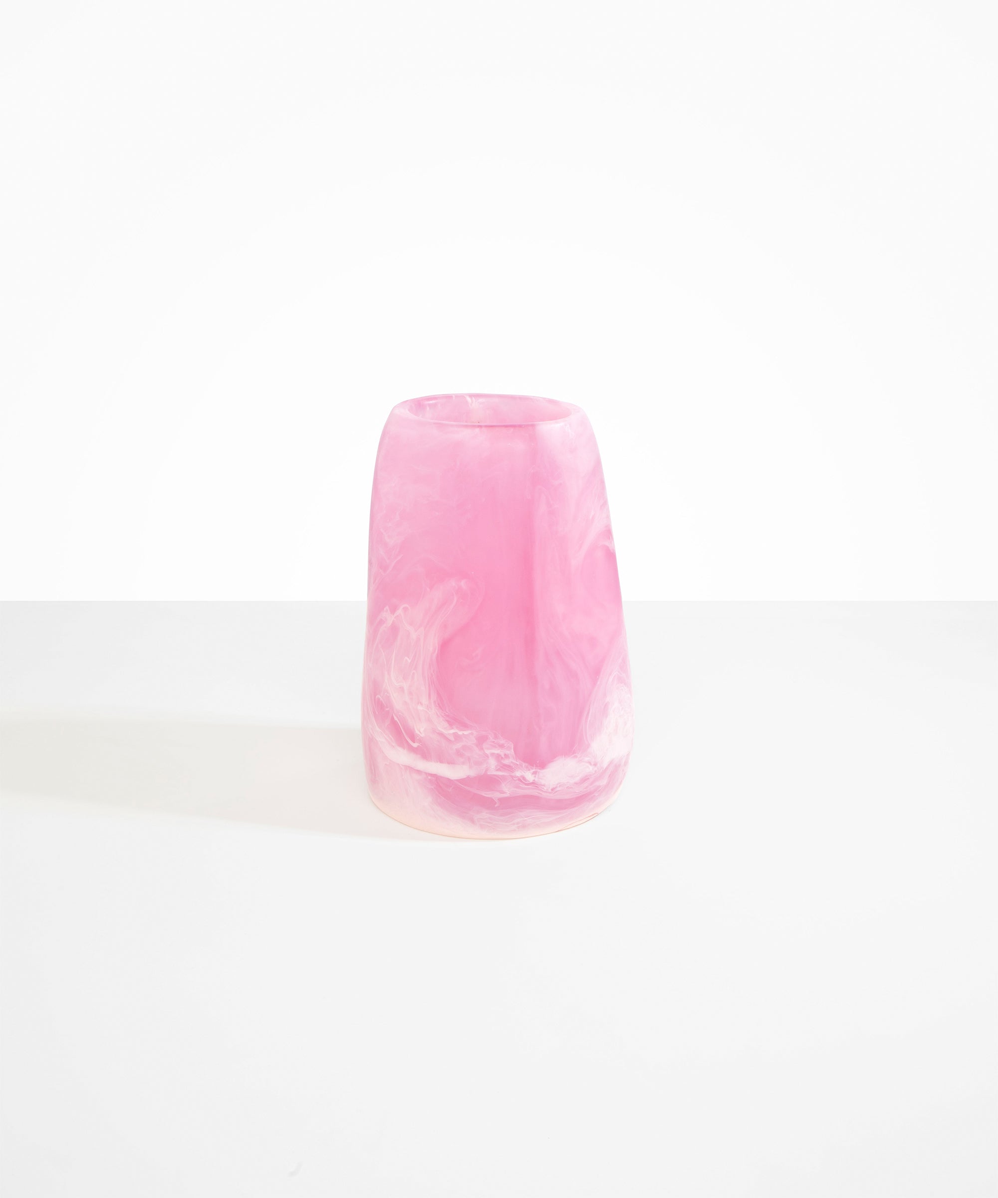 Dinosaur Designs Large Pebble Vase in Shell Pink — handcrafted marbled pink and transparent resin vase with smooth rounded pebble form and narrow opening