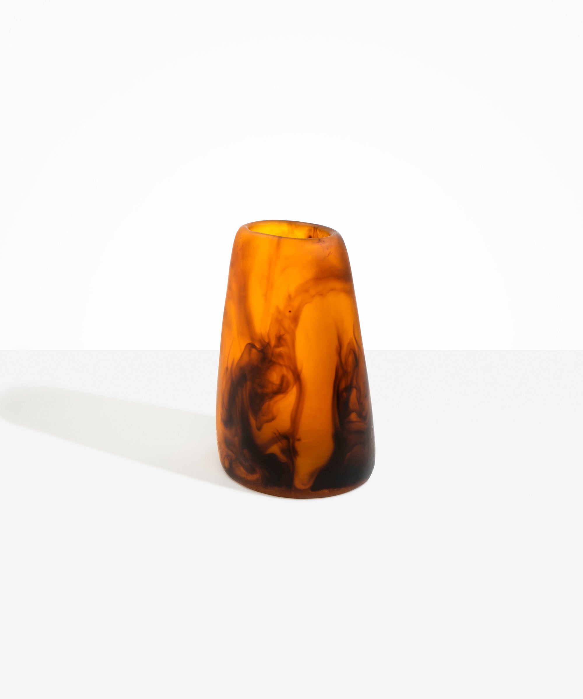 Dinosaur Designs Large Pebble Vase in Tortoise — handcrafted marbled amber and black resin vase with smooth rounded pebble form and narrow opening