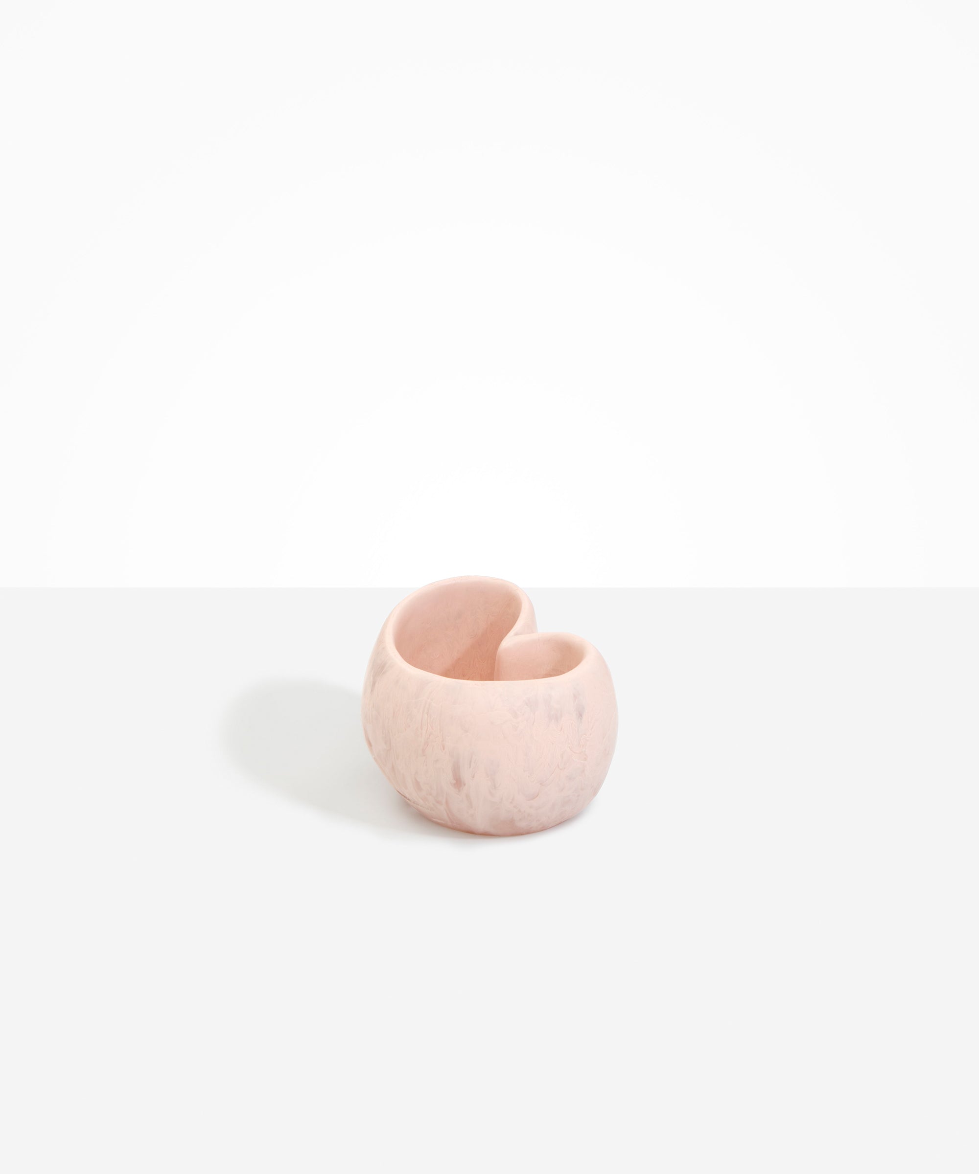 Dinosaur Designs Orchid Vase in Rose Swirl — handcrafted marbled dusty pink resin vase with short rounded organic form and sculpted open petal-shaped rim