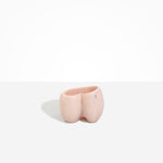 Dinosaur Designs Orchid Vase in Rose Swirl — handcrafted marbled dusty pink resin vase with short rounded organic form and sculpted open petal-shaped rim