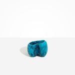 Dinosaur Designs Orchid Vase in Turquoise — handcrafted marbled teal blue resin vase with short rounded organic form and sculpted open petal-shaped rim