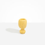Dinosaur Designs Small Rockpool Vase in Pollen — handcrafted marbled yellow resin vase with rounded bulbous body and small spherical pedestal base