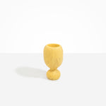 Dinosaur Designs Small Rockpool Vase in Pollen — handcrafted marbled yellow resin vase with rounded bulbous body and small spherical pedestal base