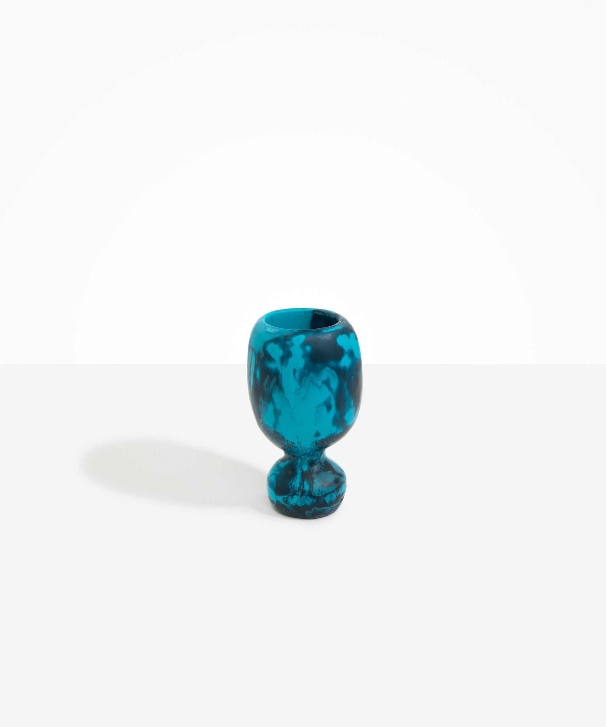 Dinosaur Designs Small Rockpool Vase in Turquoise — handcrafted marbled teal blue resin vase with rounded bulbous body and small spherical pedestal base