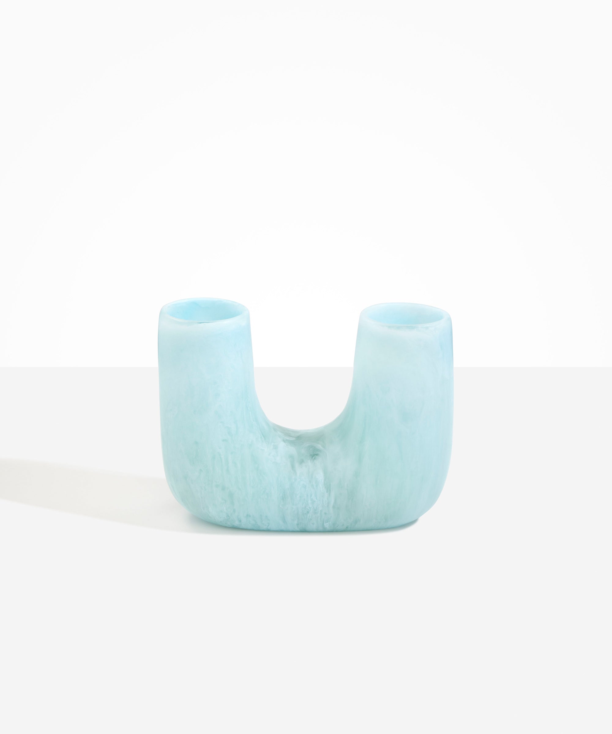 Dinosaur Designs Medium Branch Vase in Pool — handcrafted marbled blue resin vase with wide U-shaped arch form and twin openings