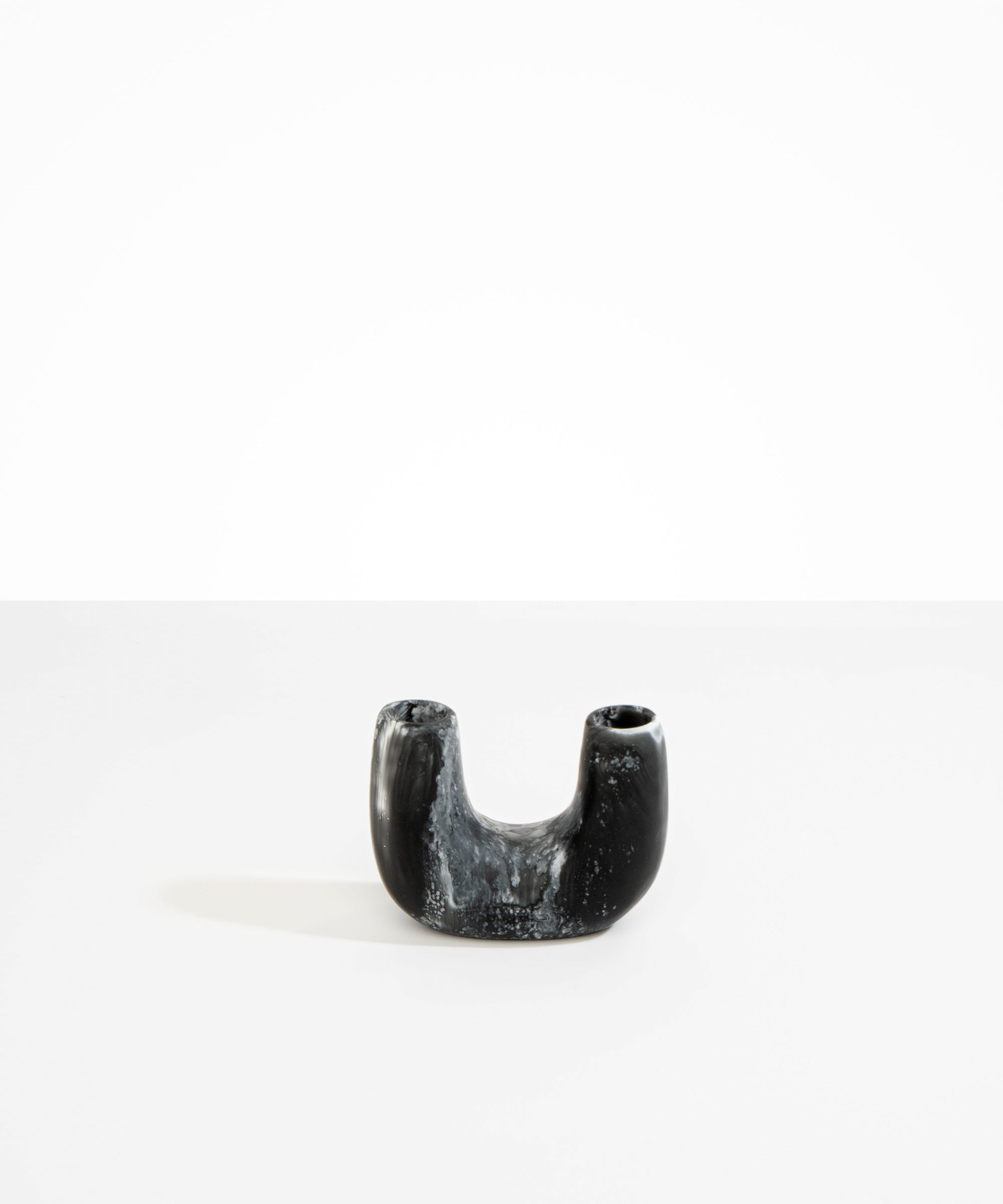 Dinosaur Designs Mini Branch Vase in Black Marble —  marbled black and white resin decorative vase with chunky U-shaped arch form and twin openings