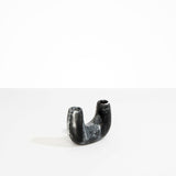 Dinosaur Designs Mini Branch Vase in Black Marble —  marbled black and white resin decorative vase with chunky U-shaped arch form and twin openings