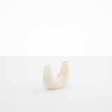 Dinosaur Designs Mini Branch Vase in Chalk Swirl —  marbled cream resin decorative vase with chunky U-shaped arch form and twin openings
