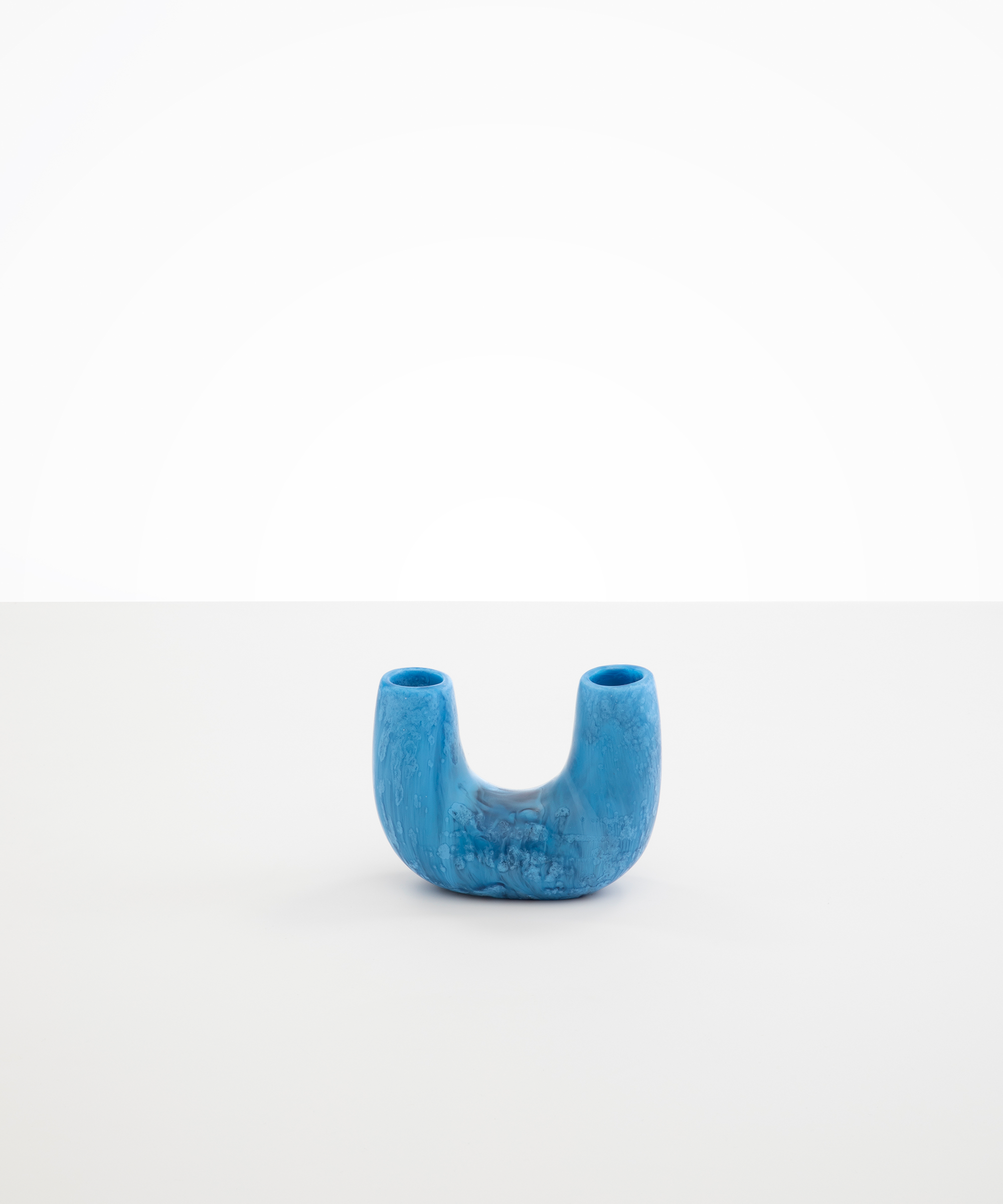 Dinosaur Designs Mini Branch Vase in Sky —  marbled blue resin decorative vase with chunky U-shaped arch form and twin openings