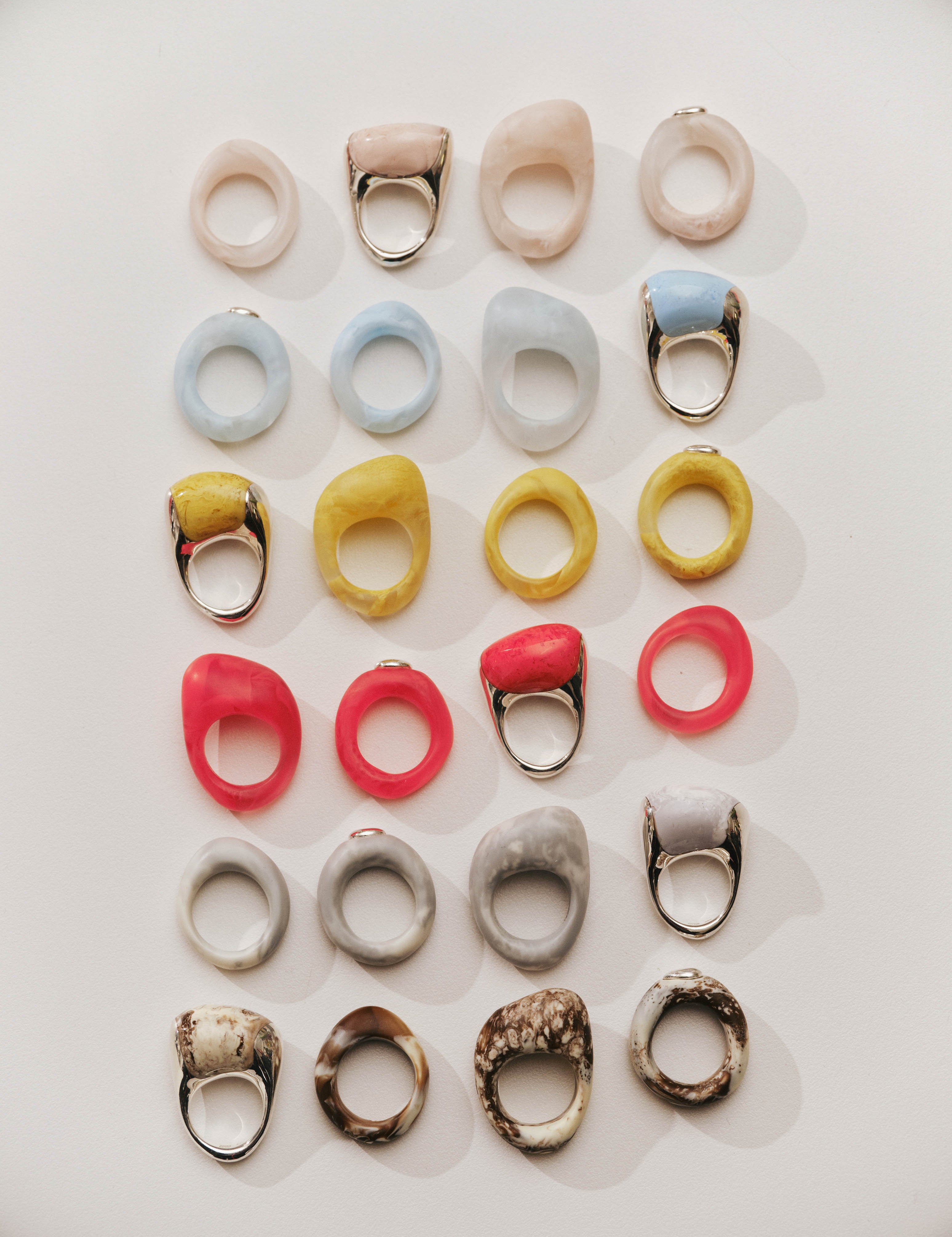 Assortment of bright rings laid out in columns