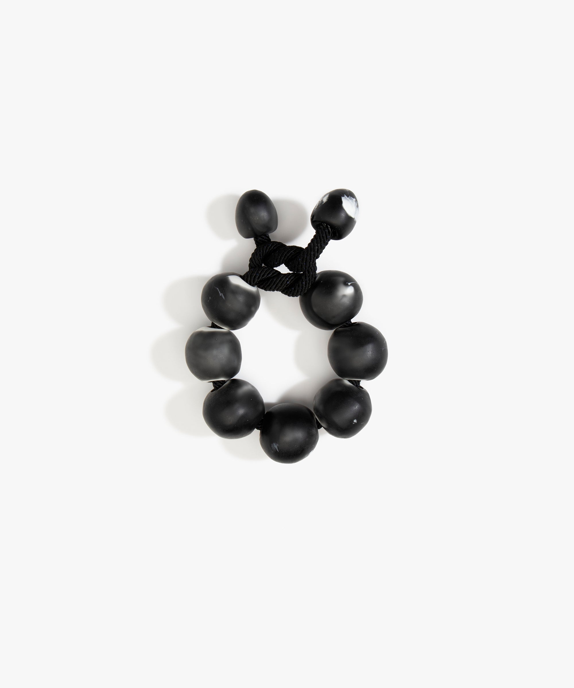 Dinosaur Designs Bold Ball Bracelet in Black Marble Colour resin with One Size Fit.