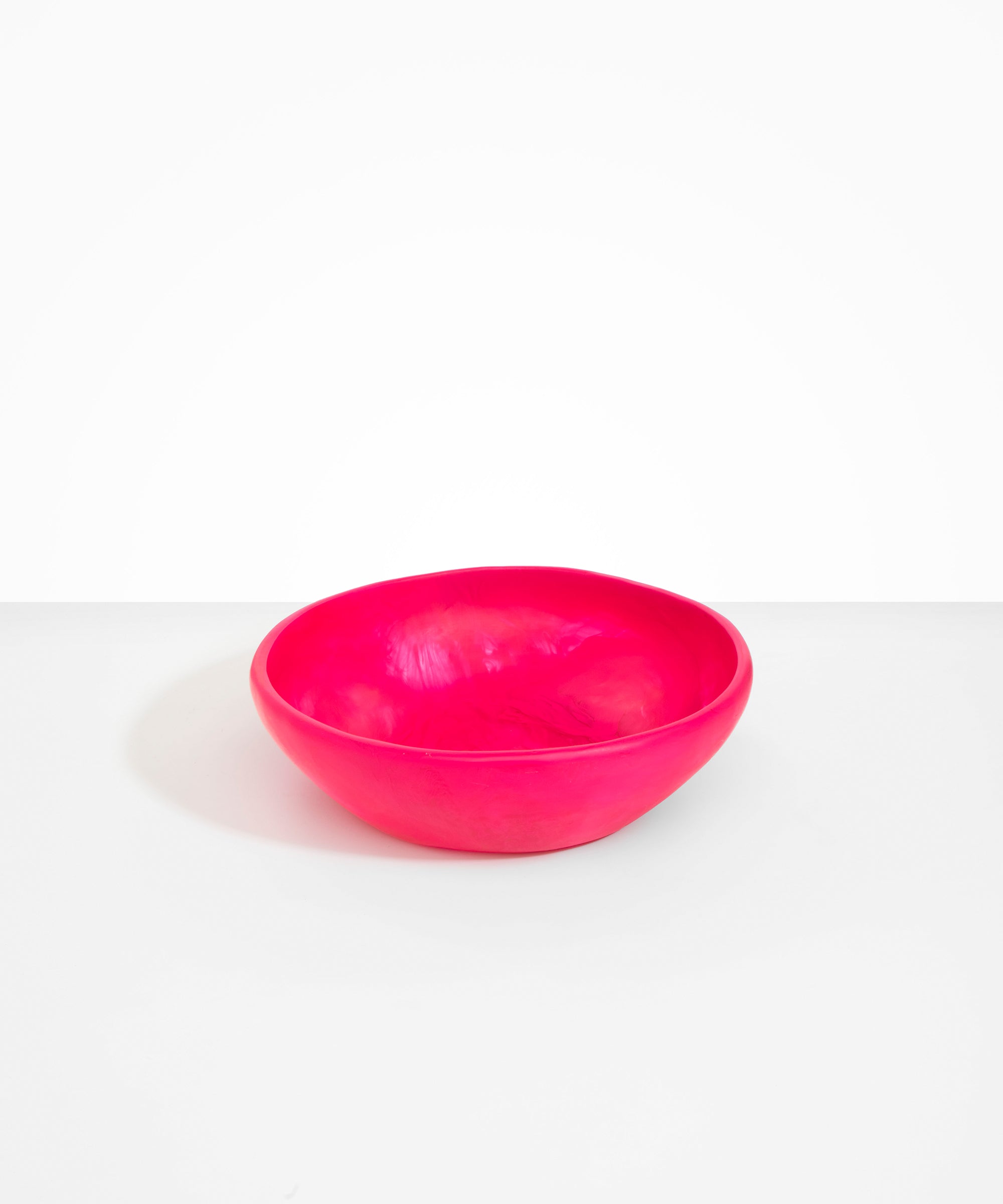 Dinosaur Designs Large Salad Bowl in Flamingo Colour resin.