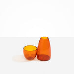 Dinosaur Designs Glass Pebble Carafe in Amber Colour resin..
