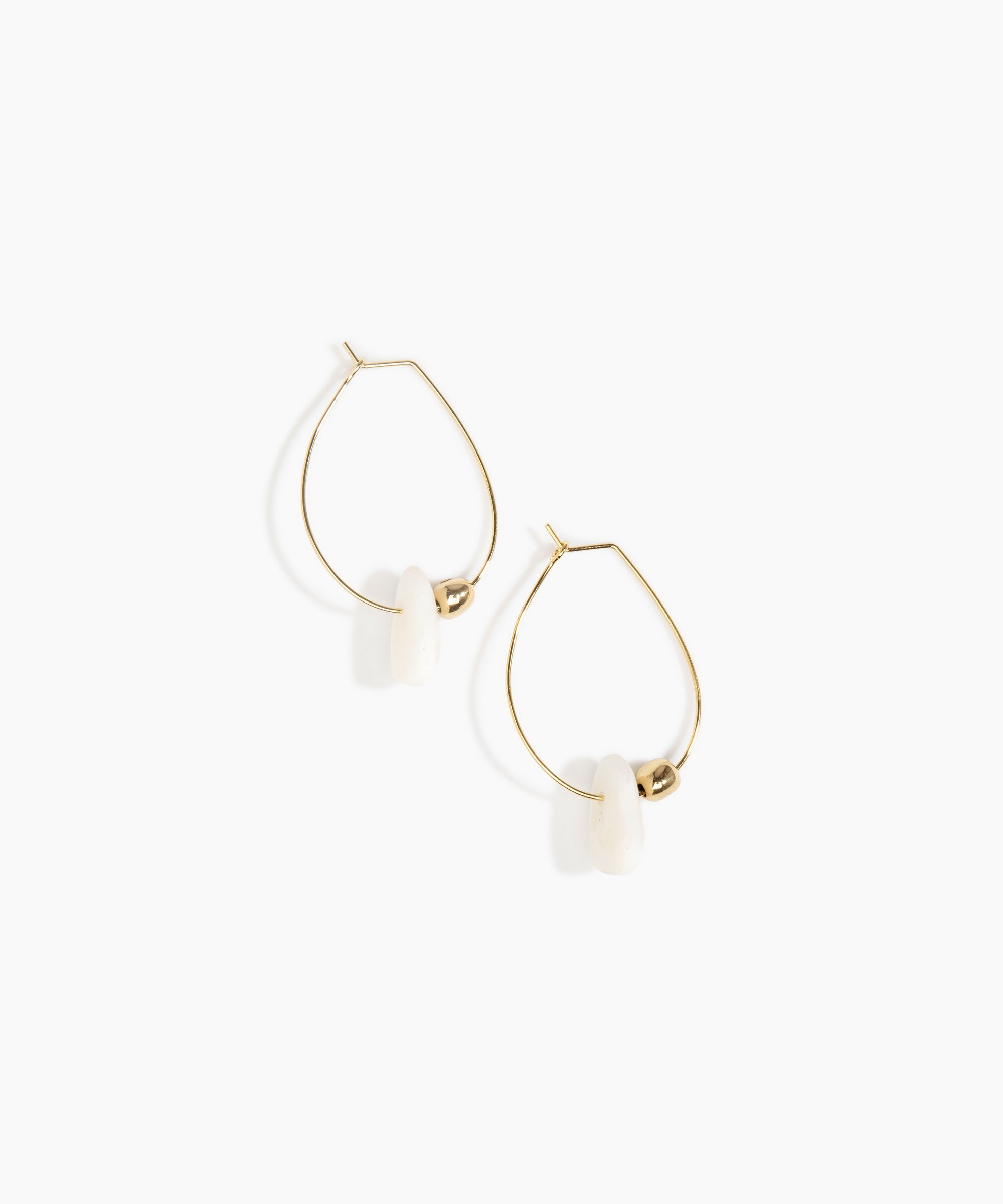 Dinosaur Designs Joie De Vivre Hoop Earrings in Snow Swirl Colour resin with Gold-Filled Material.