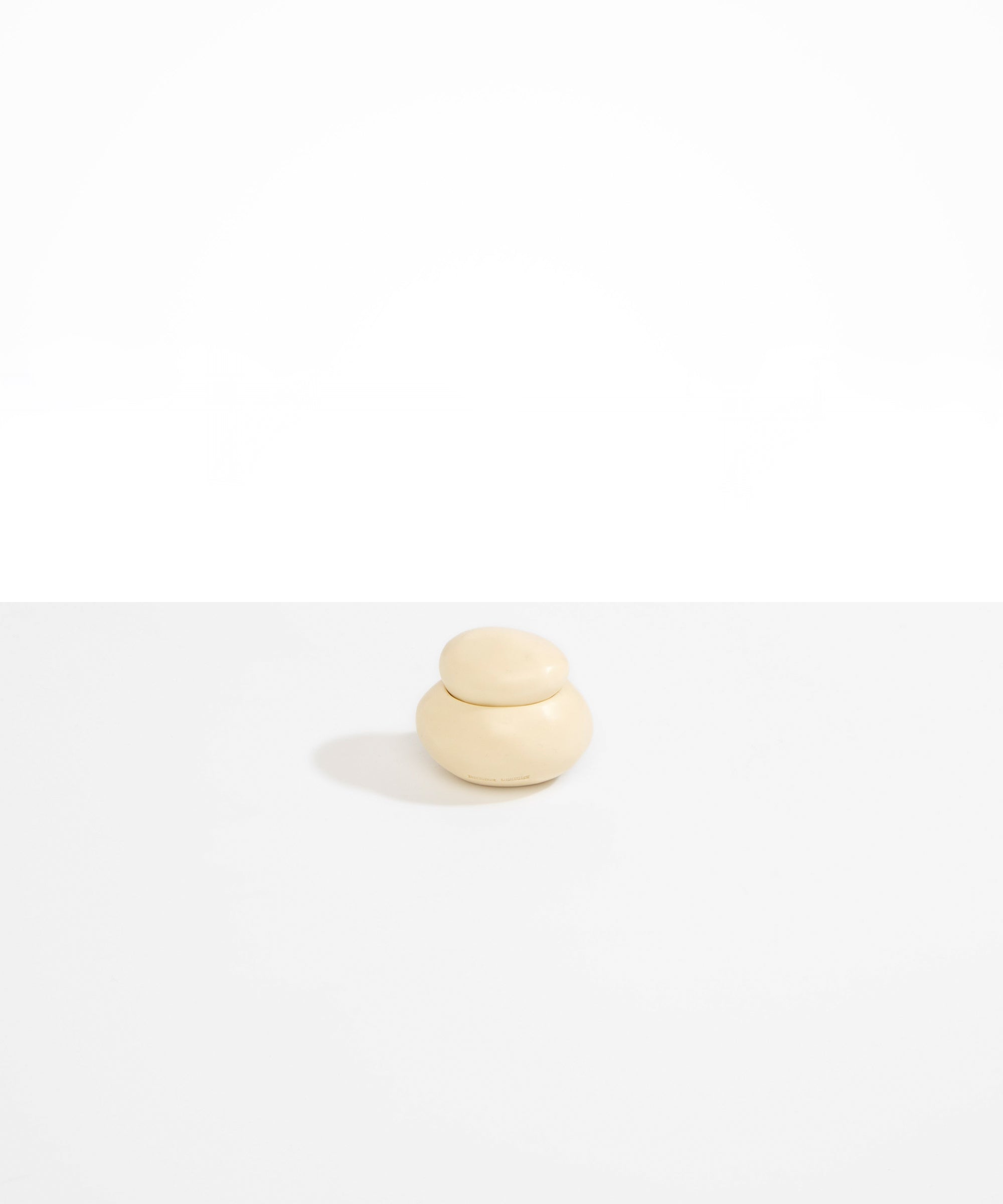 Dinosaur Designs Small Pebble Jar in Cream Colour resin..
