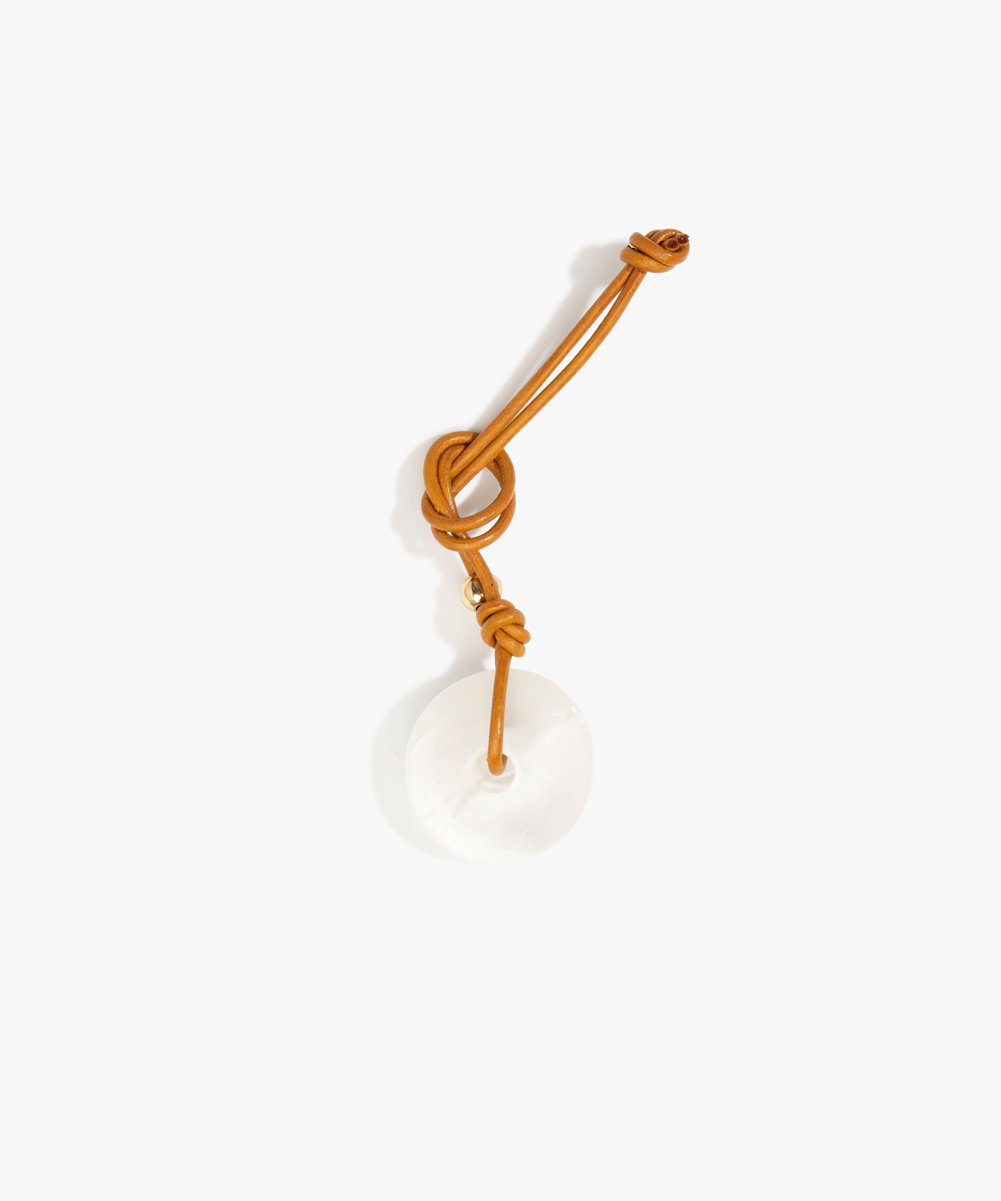 Dinosaur Designs Flat Watercolour Bag Charm in Snow Swirl Colour resin with Brass Material.