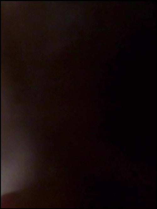 Model wearing red top with deep pink and pink toned bangles and rings with brass accents 